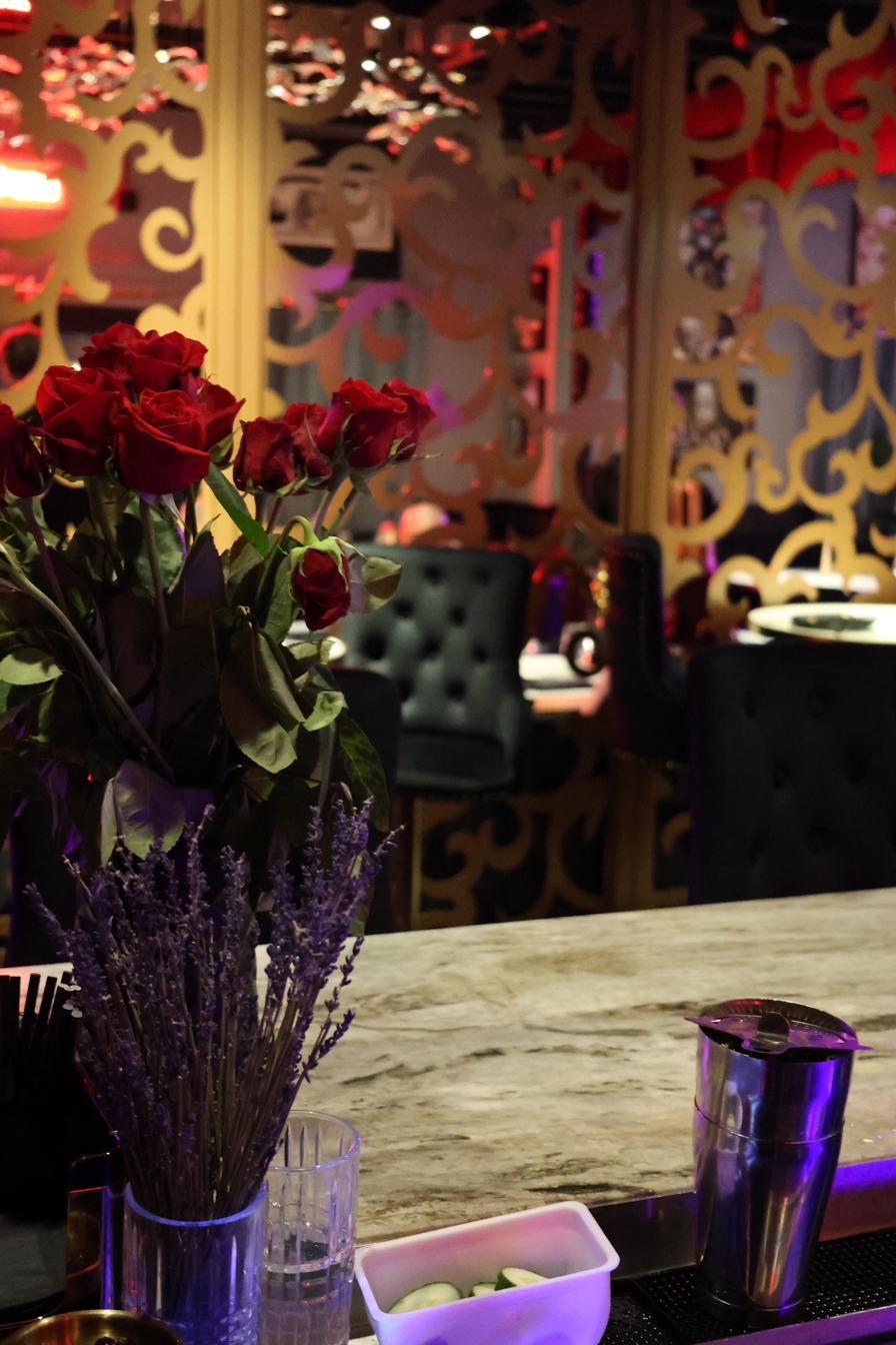 Fresh flowers on the marble bar at Blackbrick